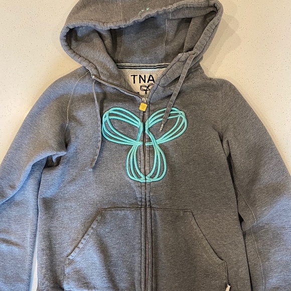 TNA Hoodie - Picture 1 of 3